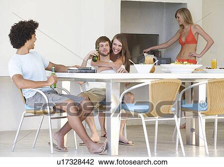 A group of teenage friends at a barbeque View Large Photo Image Stock Image - A group of teenage friends at a barbeque. Fotosearch