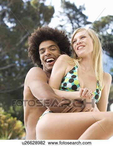 Stock Image - Portrait of a teenage couple. Fotosearch