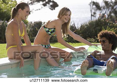 Stock Photo - Three teenage friends having fun . Fotosearch