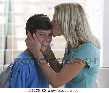 Stock Image - A mother saying goodbye to her son. Fotosearch