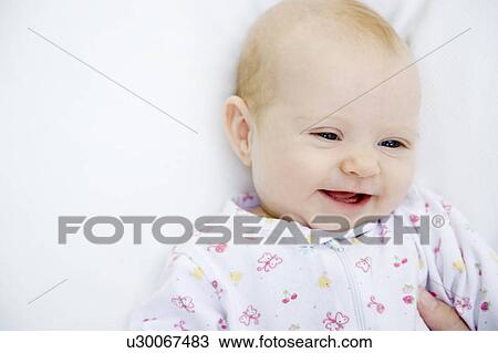 A baby laughing View Large Photo Image Stock Image - A baby laughing. Fotosearch