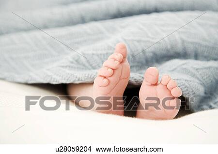 Picture - A baby sleeping. Fotosearch