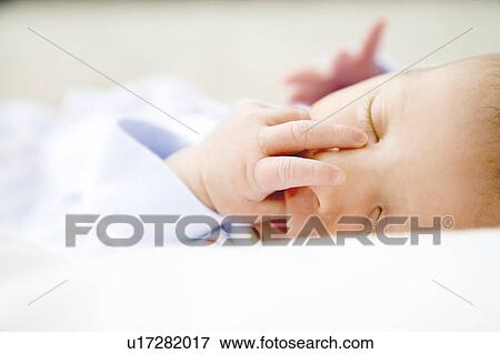 Stock Photo - A baby sleeping. Fotosearch