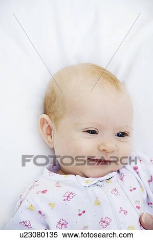 Stock Photography - A baby smiling. Fotosearch