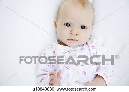 Stock Photograph - Portrait of a baby. Fotosearch