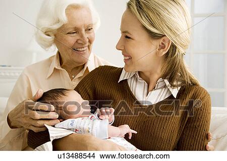 Three generations of a family View Large Photo Image Picture - Three generations of a family. Fotosearch