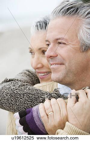 A senior couple embracing View Large Photo Image Stock Photography - A senior couple embracing. Fotosearch