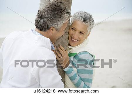 A senior couple on a beach View Large Photo Image Stock Photo - A senior couple on a beach. Fotosearch