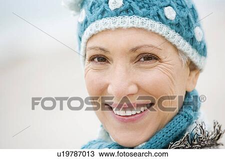 A senior woman on a beach View Large Photo Image Stock Image - A senior woman on a beach. Fotosearch