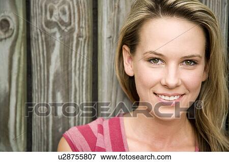 Stock Photo - Portrait of a young woman. Fotosearch