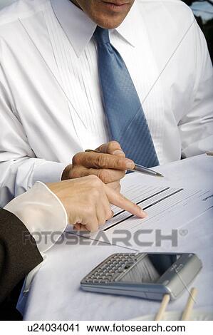 Stock Image - A business meeting. Fotosearch