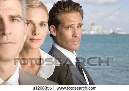 A portrait of three business colleagues View Large Photo Image Stock Image - A portrait of three business colleagues. Fotosearch