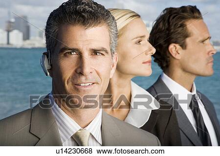 Stock Photo - A portrait of three business colleagues. Fotosearch