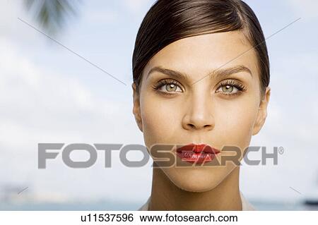 Stock Photograph - Portrait of a young woman. Fotosearch