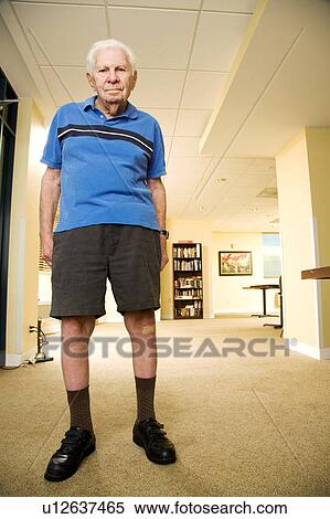 Stock Photography - An elderly man wearing shorts. Fotosearch