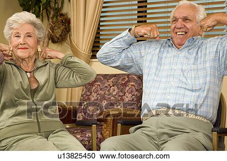 Residents in a retirement home exercising View Large Photo Image Stock Image - Residents in a retirement home exercising. Fotosearch