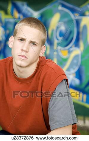 A teenage boy View Large Photo Image Stock Photograph - A teenage boy. Fotosearch