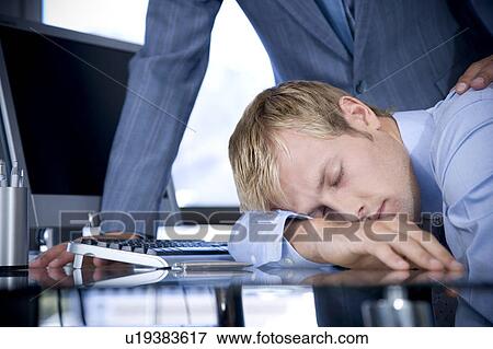 Businessman asleep at his desk View Large Photo Image Stock Photo - Businessman asleep at his desk. Fotosearch