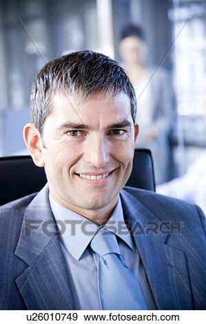 Smiling businessman portrait View Large Photo Image Stock Photo - Smiling businessman portrait. Fotosearch