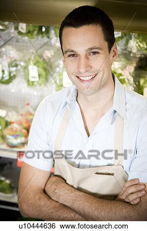 Portrait of a supermarket shop assistant. View Large Photo Image Stock Photograph - Portrait of a supermarket shop assistant. . Fotosearch