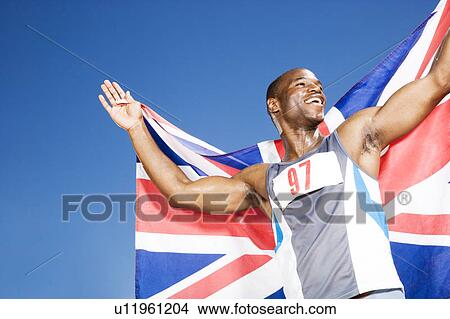 Portrait of a male athlete with UK flag View Large Photo Image Picture - Portrait of a male athlete with UK flag. Fotosearch