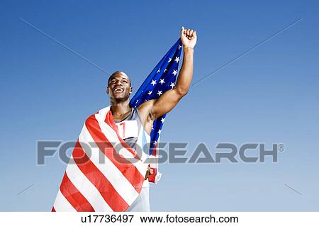 Portrait of a male athlete with US flag View Large Photo Image Stock Photo - Portrait of a male athlete with US flag. Fotosearch