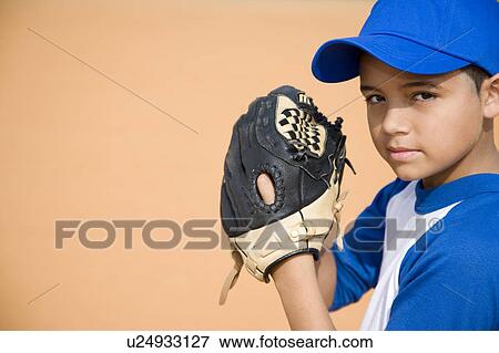 Boy preparing to pitch baseball View Large Photo Image Stock Photo - Boy preparing to pitch baseball. Fotosearch