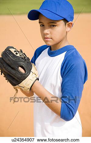 Boy preparing to throw baseball View Large Photo Image Stock Photo - Boy preparing to throw baseball. Fotosearch