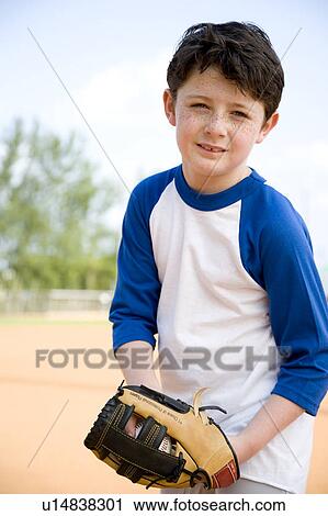 Boy with catcher's mitt and baseball View Large Photo Image Stock Image - Boy with catcher's mitt and baseball. Fotosearch