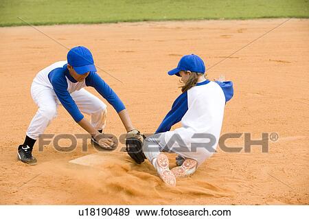 girl being run out in baseball View Large Photo Image Stock Photo - girl being run out in baseball. Fotosearch
