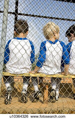 rear view little league baseball team sitting on bench View Large Photo Image Stock Photograph - rear view little league baseball team sitting on bench. Fotosearch