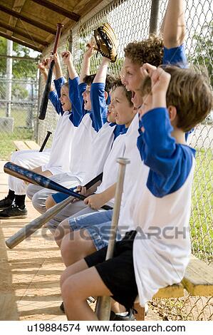 Side view little league baseball team cheering View Large Photo Image Picture - Side view little league baseball team cheering. Fotosearch