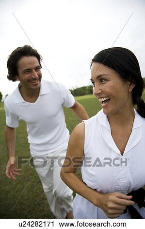 couple having fun in the park View Large Photo Image Stock Image - couple having fun in the park. Fotosearch