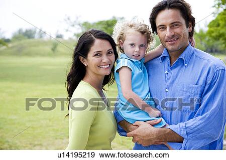 Stock Photo - family portrait in park. Fotosearch