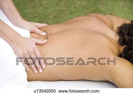 Man receiving a massage, close up View Large Photo Image Stock Photography - Man receiving a massage, close up. Fotosearch