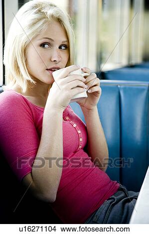 Picture - Portrait of a teenage girl hanging out at a diner. Fotosearch
