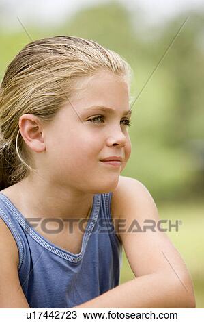 portrait girl resting arm on knee View Large Photo Image Stock Image - portrait girl resting arm on knee. Fotosearch