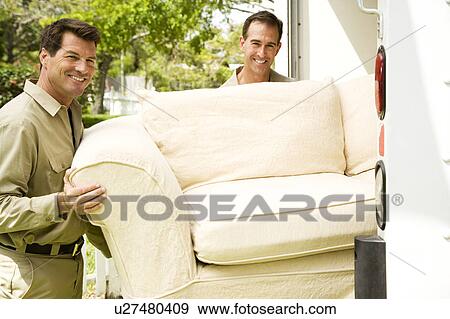 Removal men with sofa beside their van View Large Photo Image Stock Photo - Removal men with sofa beside their van. Fotosearch