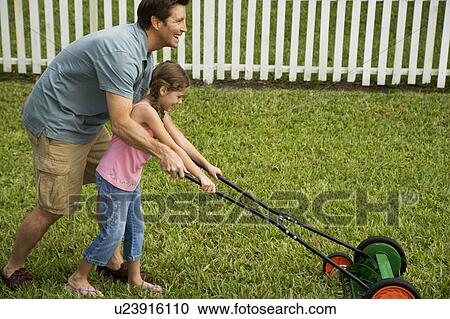 father and daughter mowing the lawn togethern View Large Photo Image Stock Image - father and daughter mowing the lawn togethern. Fotosearch