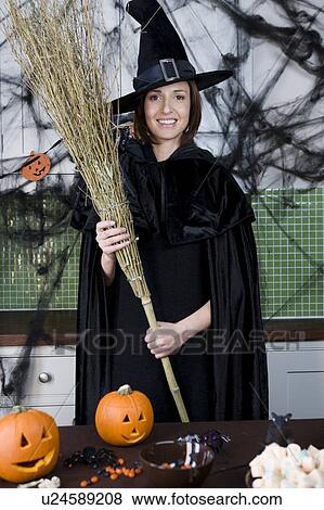 Mother in fancy dress at a Halloween party View Large Photo Image Stock Photo - Mother in fancy dress at a Halloween party . Fotosearch