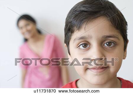 Portrait of a schoolboy smiling View Large Photo Image Stock Image - Portrait of a schoolboy smiling. Fotosearch