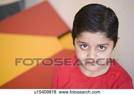 Portrait of a schoolboy smiling View Large Photo Image Stock Photo - Portrait of a schoolboy smiling. Fotosearch