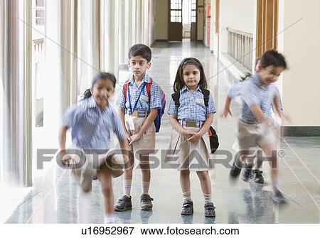 Stock Photo - Students at the corridor of a school. Fotosearch