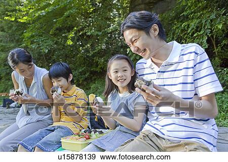 Family Enjoying Picnic View Large Photo Image Stock Photo - Family Enjoying Picnic. Fotosearch