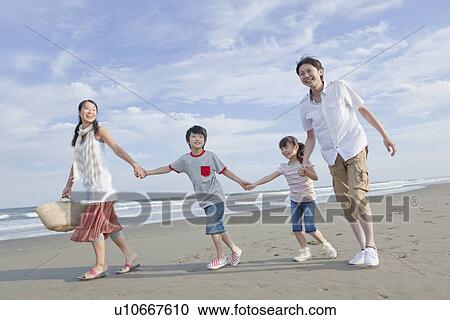 Family Walking Beach View Large Photo Image Stock Image - Family Walking Beach. Fotosearch