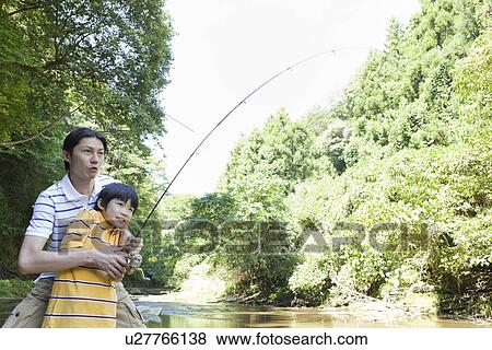 Father and Son Enjoying Fishing View Large Photo Image Stock Photo - Father and Son Enjoying Fishing. Fotosearch