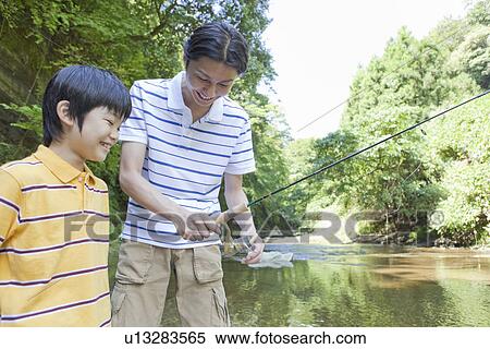 Father and Son Enjoying Fishing View Large Photo Image Stock Photography - Father and Son Enjoying Fishing. Fotosearch