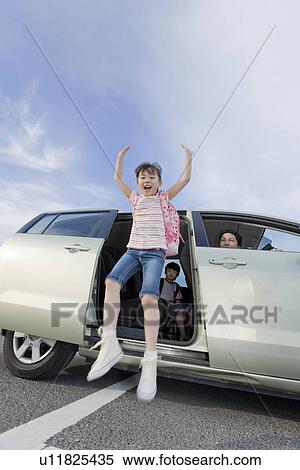 Girl Jumping Out of a Car View Large Photo Image Stock Photography - Girl Jumping Out of a Car. Fotosearch