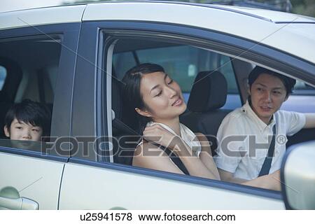 Mother Stretching at Driver's Seat View Large Photo Image Stock Photo - Mother Stretching at Driver's Seat. Fotosearch