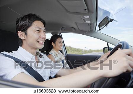 Young Couple Going for a Drive View Large Photo Image Stock Photo - Young Couple Going for a Drive. Fotosearch